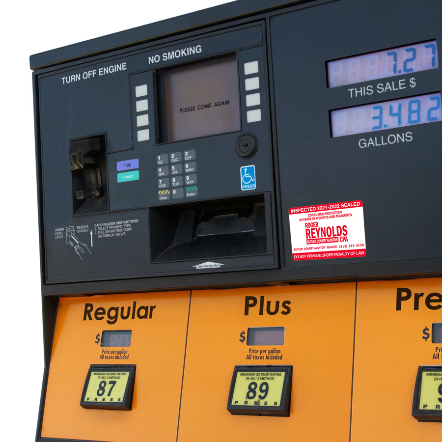 306451 - gas pump with color scheme altered to protect vendor's trademark.