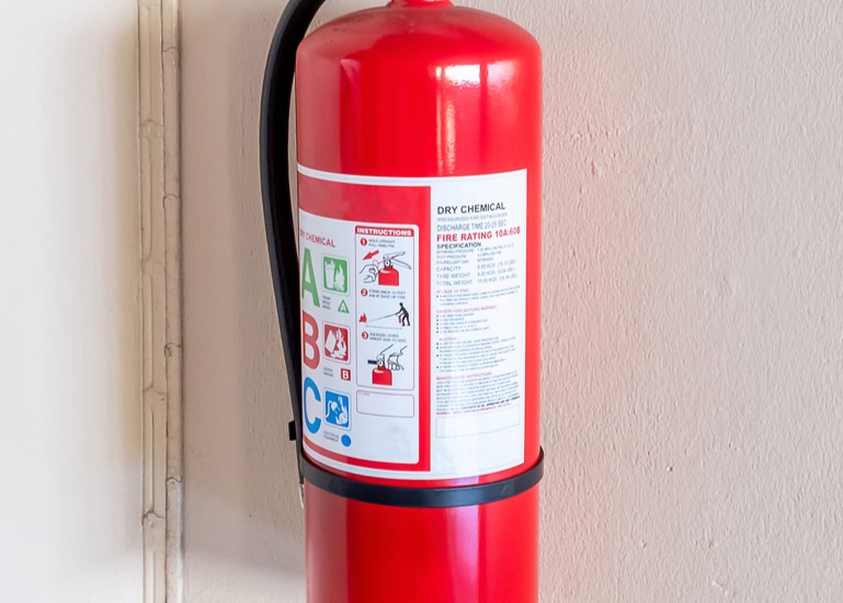 Durable/Industrial label on a fire extinguisher.